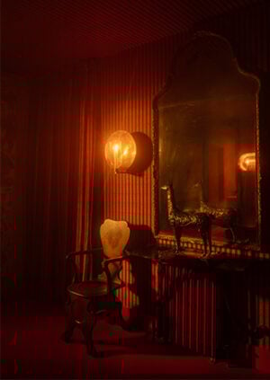 The Aten Hurricane Wall Light - With Candle: lifestyle