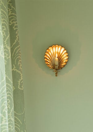 The Shell Wall Light - Small With Candle: lifestyle
