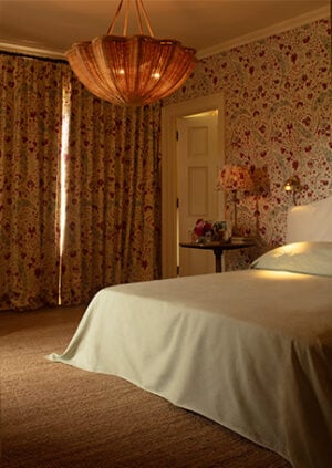 The Rattan Daisy Hanging Light - Medium With Rope: lifestyle