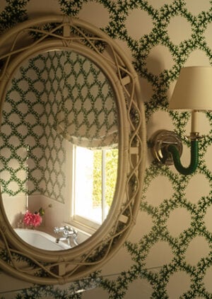 The Rattan Round Cygnet Wall Light: lifestyle
