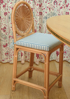 The Rattan Carousel Counter Height Stool: lifestyle