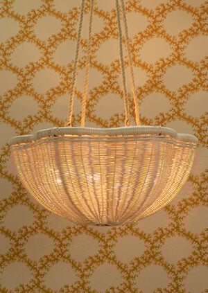 The Rattan Daisy Hanging Light - Small With Rope: lifestyle