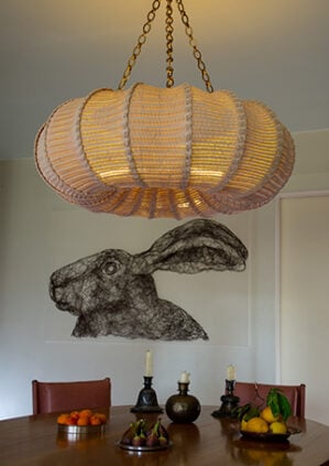 The Rattan Pasha Hanging Light - Medium With Chain: lifestyle
