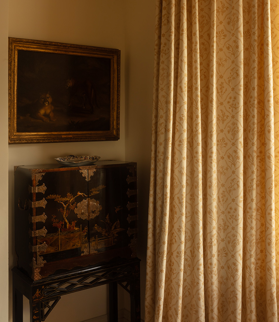 Lucknawi Flower Straw large curtains next to antique cabinet and oil painting 