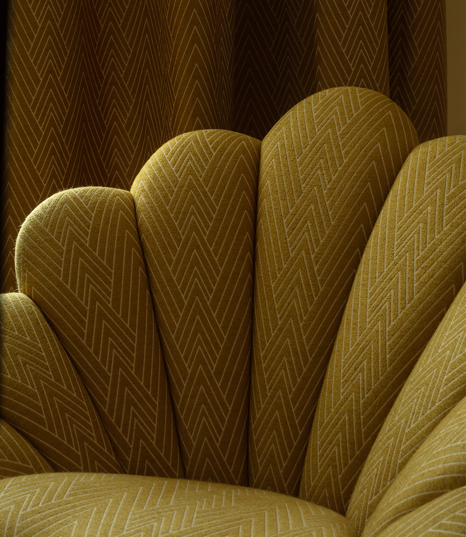 Philae Old Gold upholstered on a chair and curtains