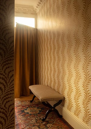 Scrolling Fern Frond Wallpaper - Ochre: lifestyle