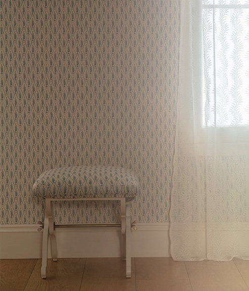 Alexis stool in blue and white fabric with matching wallpaper