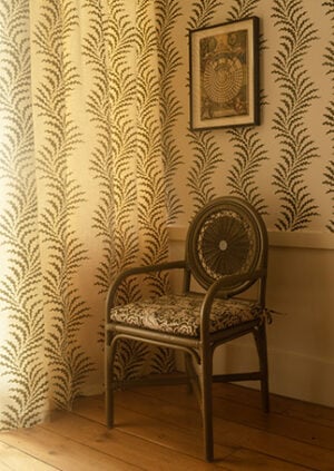 The Rattan Carousel Dining Chair - With Arms: lifestyle